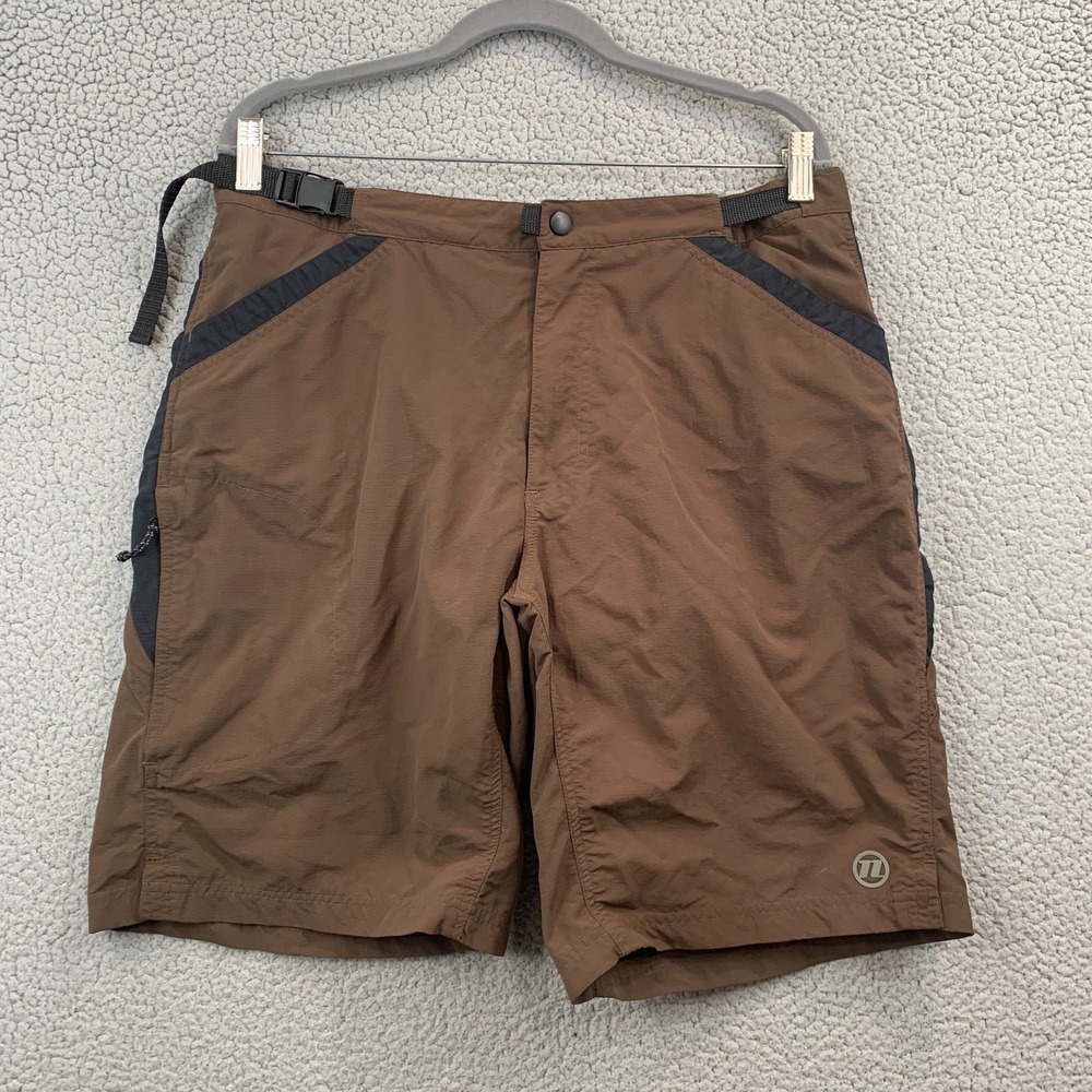 Novara Size L Mens Brown Cycling Lined Zip Pockets Zip Button Belted Shorts Pad